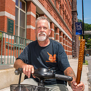 photo of a senior citizen living in a rental housing property renovated with funds from PHFA